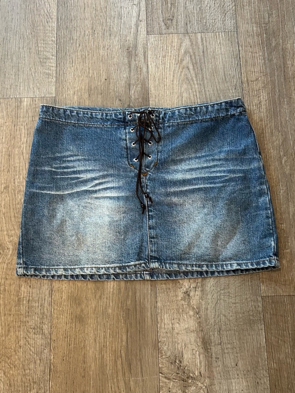 Y2K Paris Blues Denim Mini Skirt with Lace Up Front. Size: 9